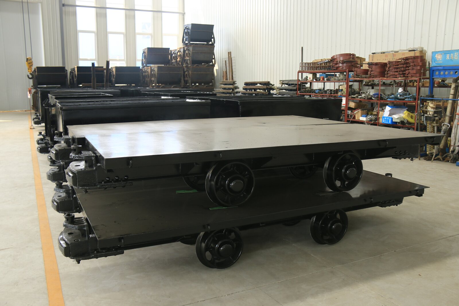 Mining flat car prepared for heavy equipment load planning